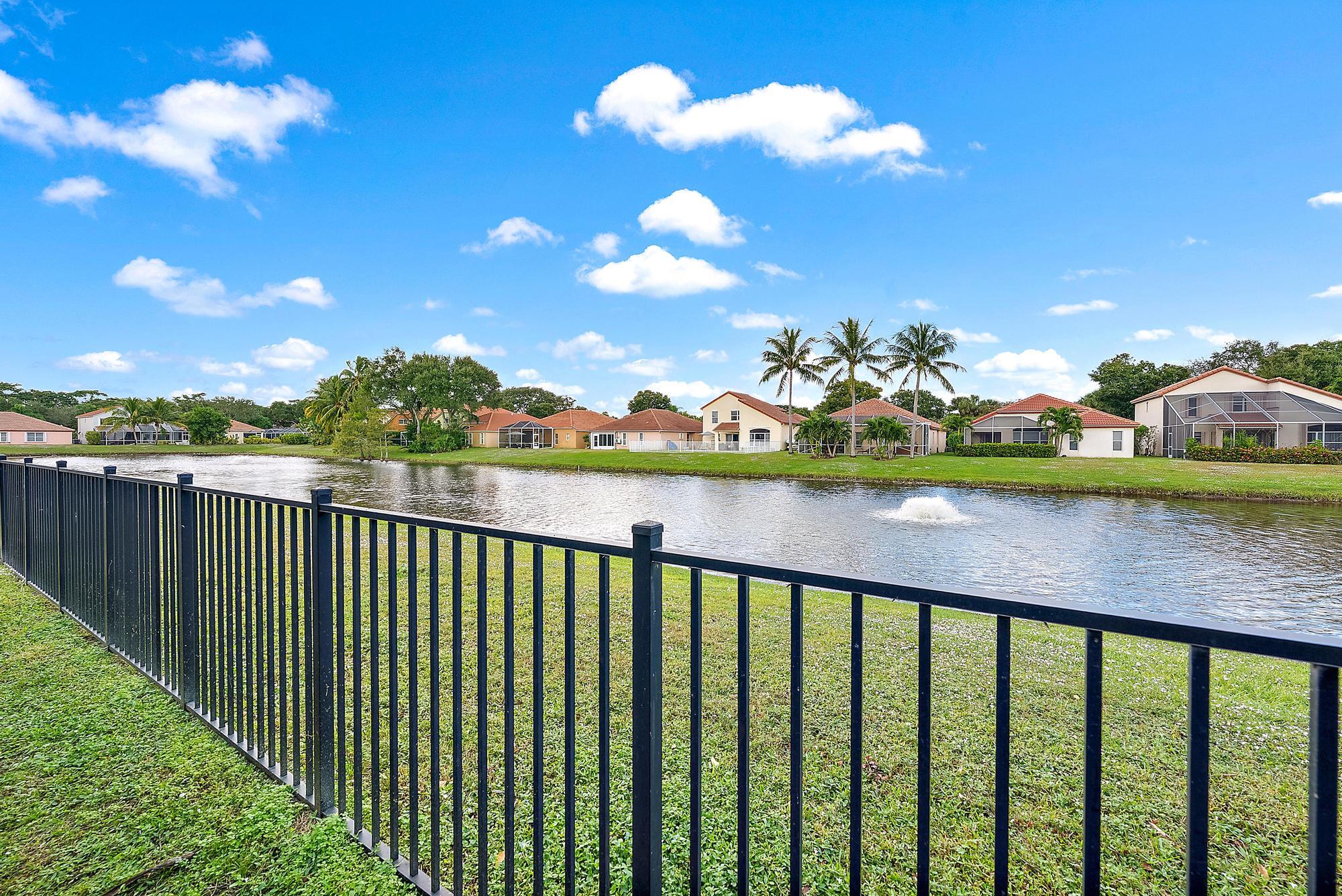5010 Elpine Way Riviera Beach, FL 33418 - Photo 21 of 27 a view of lake from balcony