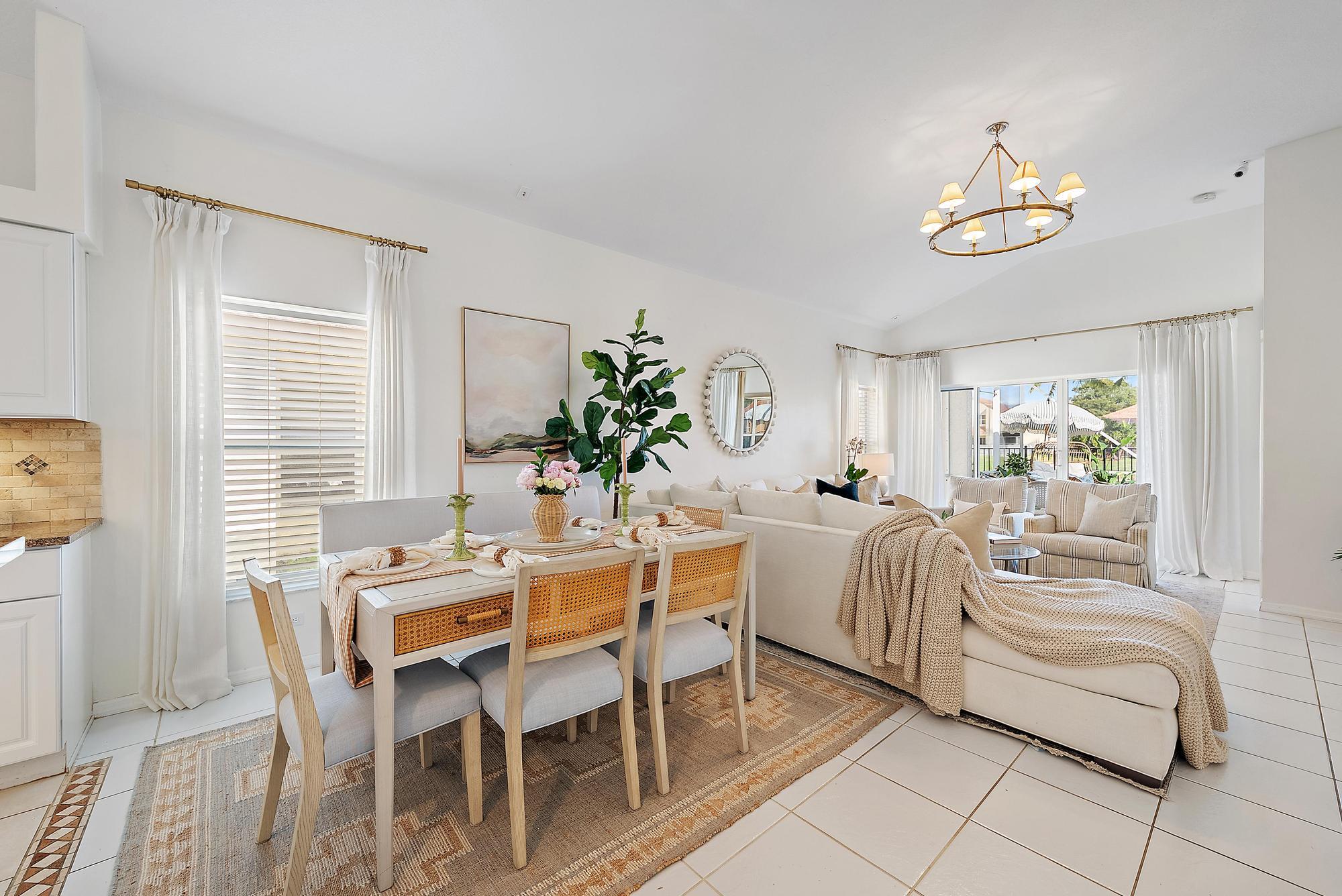 5010 Elpine Way Riviera Beach, FL 33418 - Photo 7 of 27 a view of a dining room with furniture