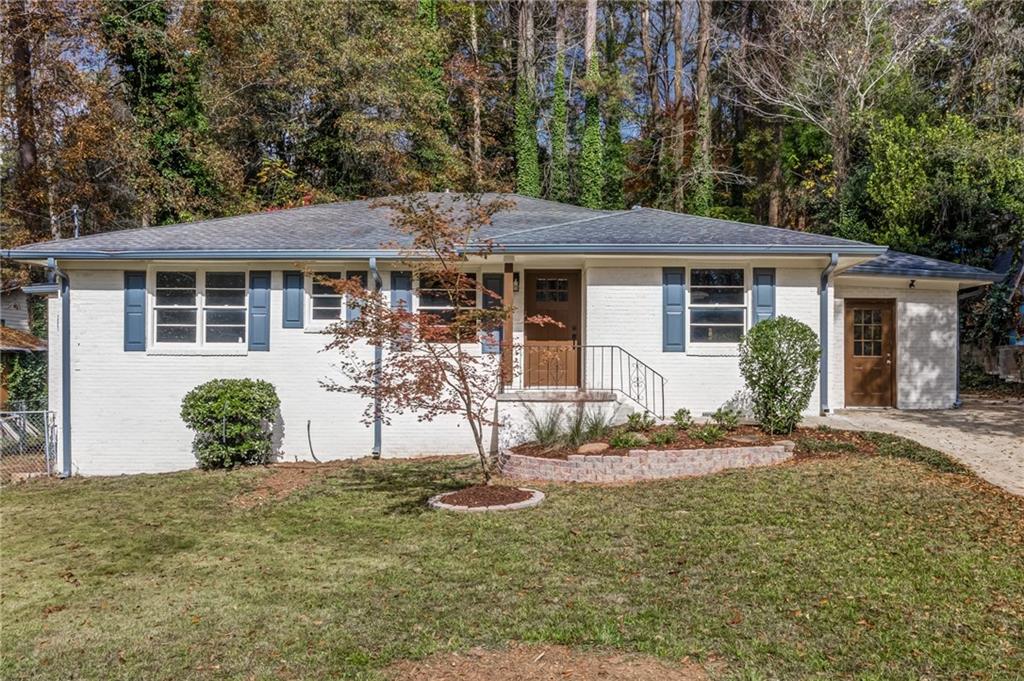2418 Hunting Valley Drive Decatur, GA 30033 - Photo 1 of 1 front view of a house with a yard