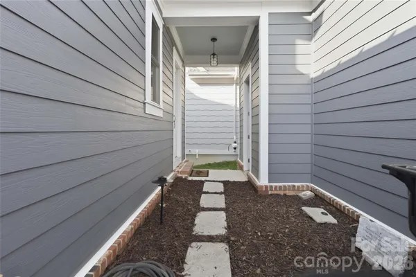 a view of house with backyard