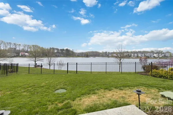 a view of a golf course with a lake