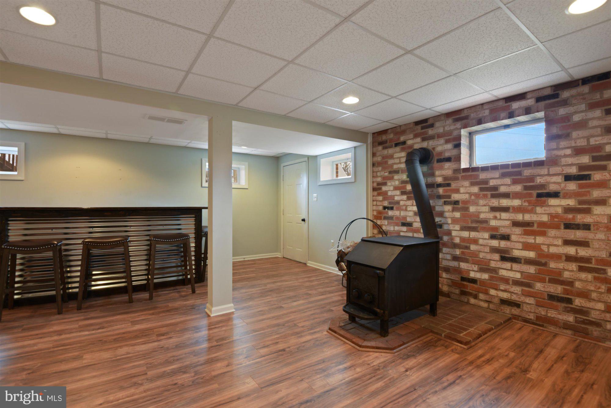 15071 New Windsor Road New Windsor, MD 21776 - Photo 18 of 27 LL Family Room w/Wood Stove