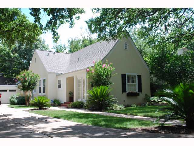 1407 Westover Road Austin, TX 78703 - Photo 1 of 1 a front view of a house with a yard and garage