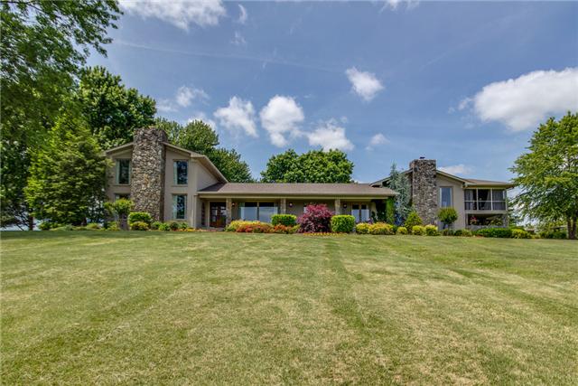 220 Bethlehem Road Lebanon, TN 37087 - Photo 1 of 20 a front view of a house with a garden