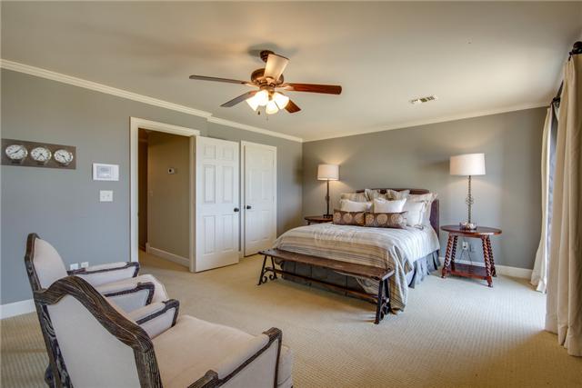 220 Bethlehem Road Lebanon, TN 37087 - Photo 11 of 20 a bedroom with a bed and a chandelier