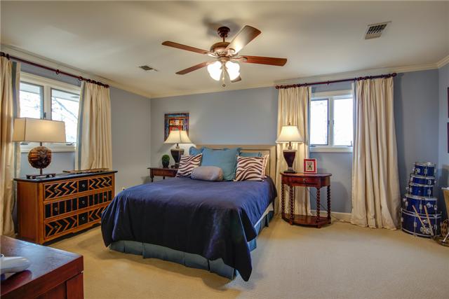 220 Bethlehem Road Lebanon, TN 37087 - Photo 13 of 20 a bedroom with a bed and a chandelier