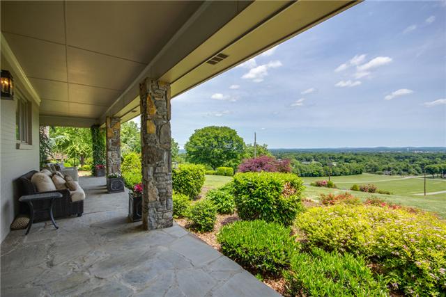 220 Bethlehem Road Lebanon, TN 37087 - Photo 18 of 20 a view of a chair and tables in the patio next to a yard