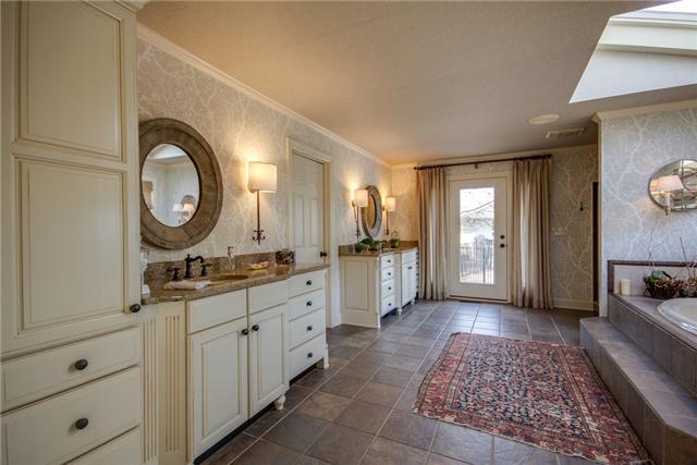 220 Bethlehem Road Lebanon, TN 37087 - Photo 9 of 20 a bathroom with a granite countertop sink a mirror and a vanity