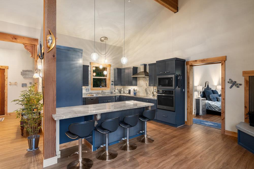 522 Night Hawk Portola, CA 96122 - Photo 17 of 54 a kitchen with a table and chairs in it