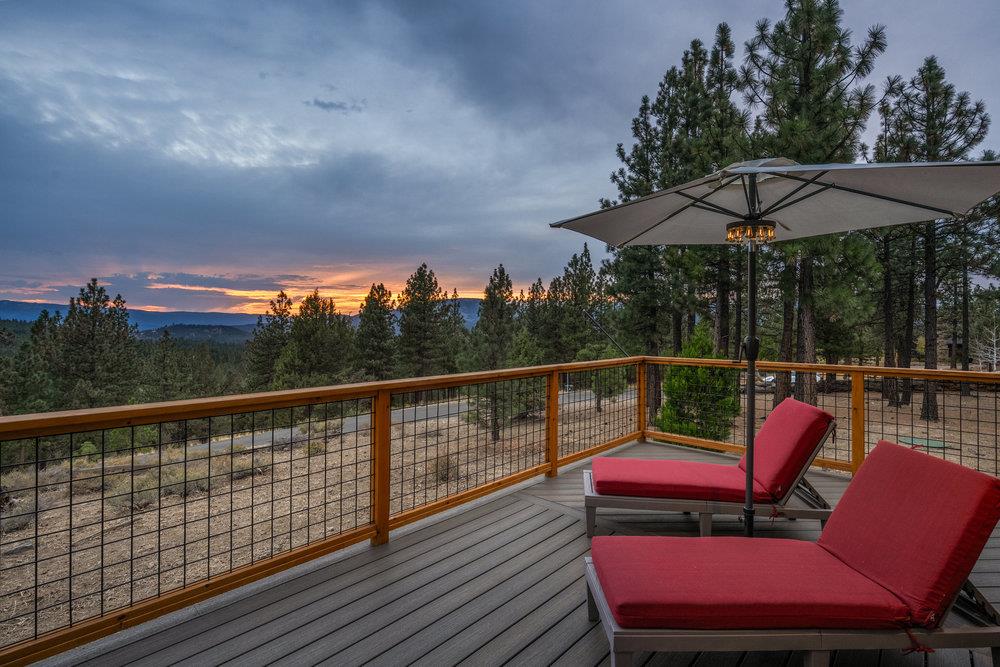 522 Night Hawk Portola, CA 96122 - Photo 34 of 54 a balcony with wooden floor table and chairs
