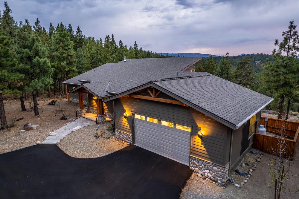 522 Night Hawk Portola, CA 96122 - Photo 52 of 54 an aerial view of a house with swimming pool and trees in the background