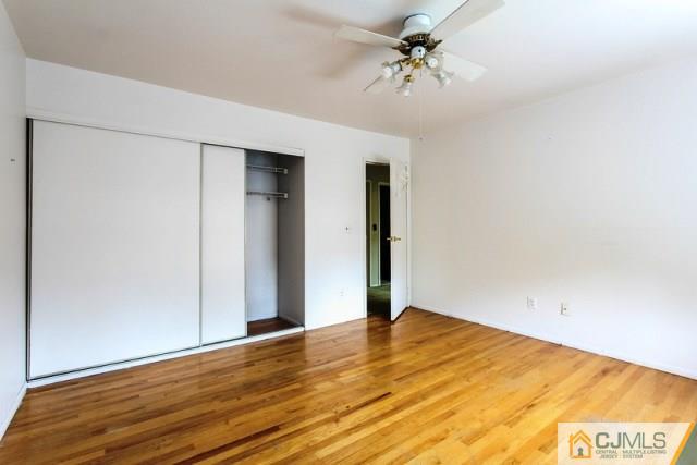 7202 Hana Road Edison, NJ 08817 - Photo 11 of 25 a view of a big room with wooden floor