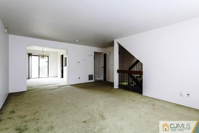 7202 Hana Road Edison, NJ 08817 - Photo 17 of 25 a view of an empty room with a window