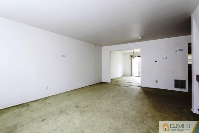 7202 Hana Road Edison, NJ 08817 - Photo 18 of 25 an empty room with a empty space