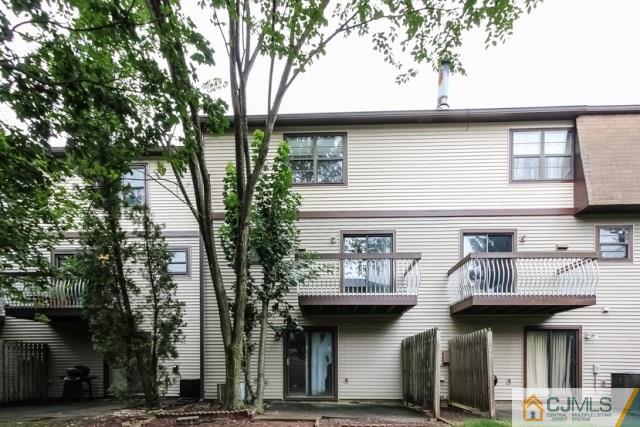 7202 Hana Road Edison, NJ 08817 - Photo 3 of 25 a view of a house with roof and sitting area