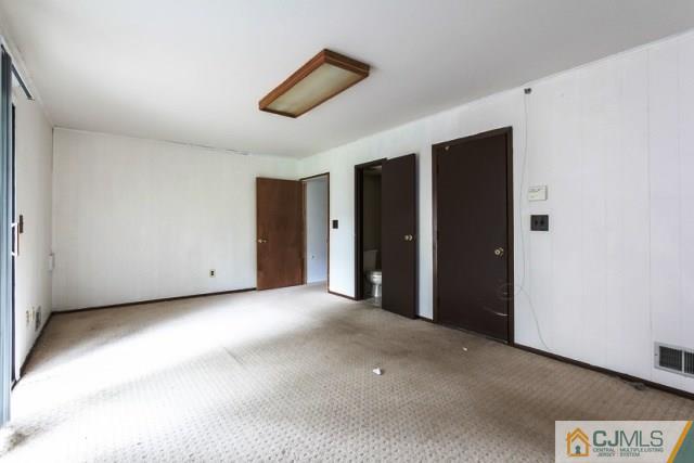 7202 Hana Road Edison, NJ 08817 - Photo 4 of 25 a view of a livingroom with an empty space