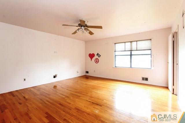 7202 Hana Road Edison, NJ 08817 - Photo 10 of 25 a view of an empty room and window