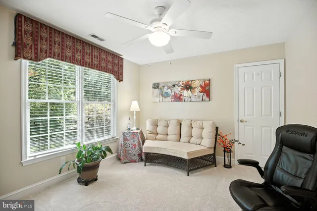 a kitchen with a stove sink and a mirror