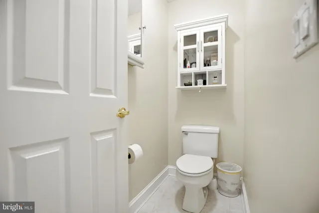 a view of a refrigerator in a kitchen