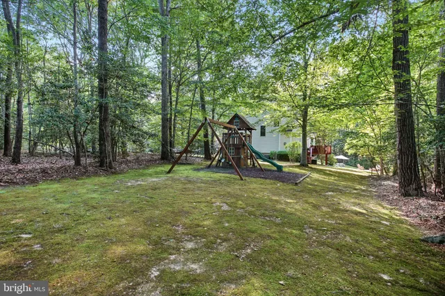 a view of a yard with an outdoor space