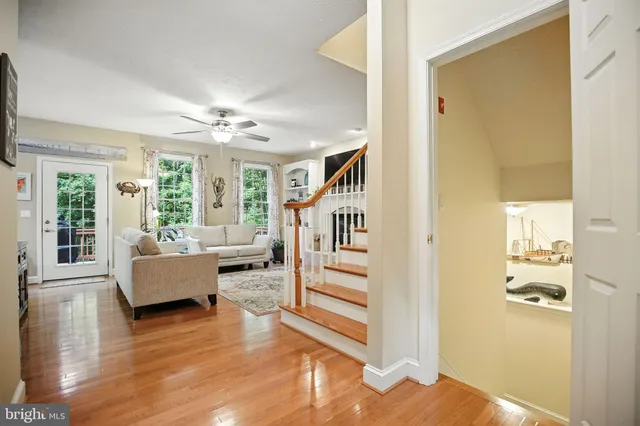 a view of a chairs and table on the wooden deck