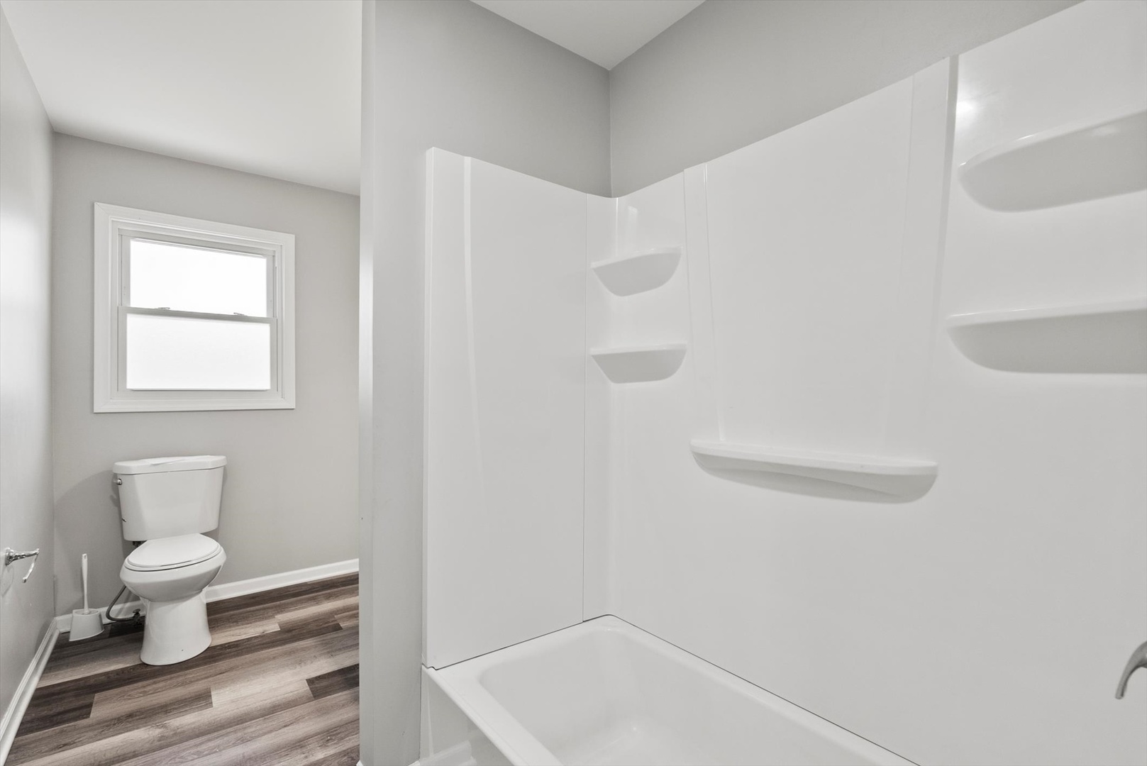 32W266 Glos Street Wayne, IL 60184 - Photo 9 of 24 a bathroom with a toilet and a sink