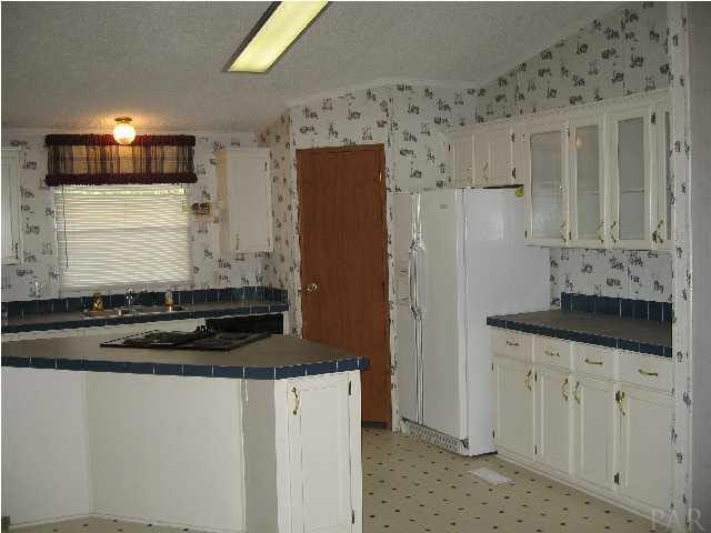 19847 Vaughn Road Seminole, AL 36574 - Photo 4 of 24 KITCHEN ISLAND & PANTRY