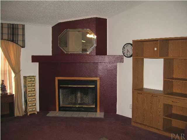 19847 Vaughn Road Seminole, AL 36574 - Photo 7 of 24 CORNER WOODBURNING FIREPLACE