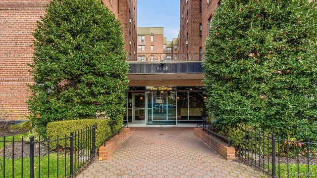 a view of a building with a garden