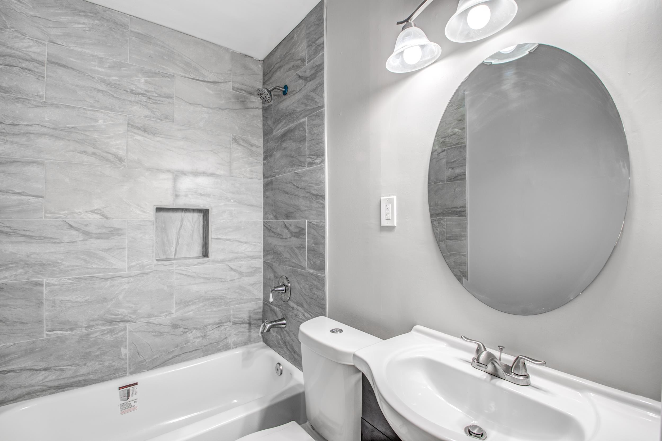 835 Watson Street Memphis, TN 38111 - Photo 15 of 24 Bathroom featuring vanity and shower / tub combination