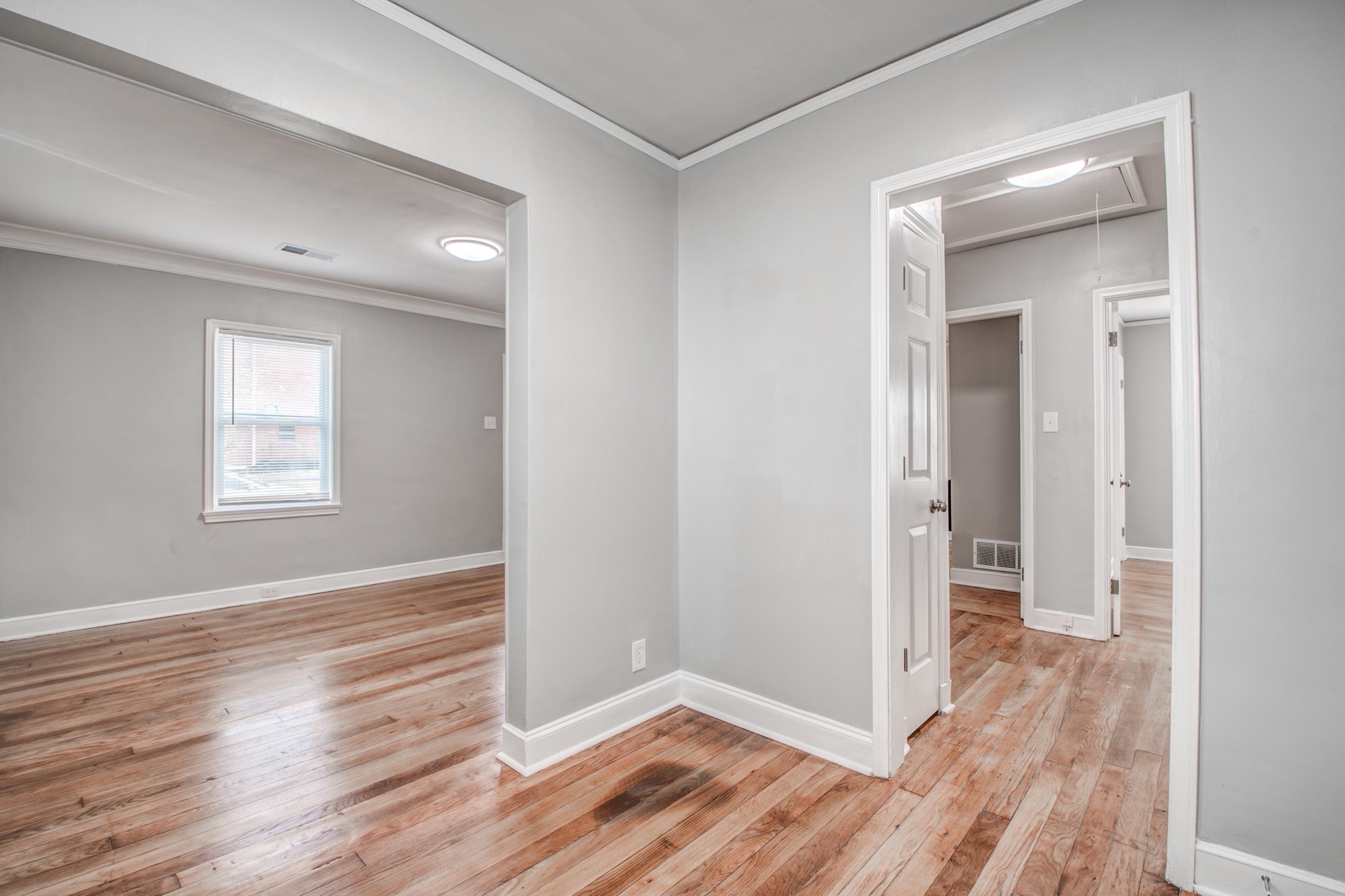 835 Watson Street Memphis, TN 38111 - Photo 20 of 24 Empty room featuring ornamental molding and light wood-type flooring