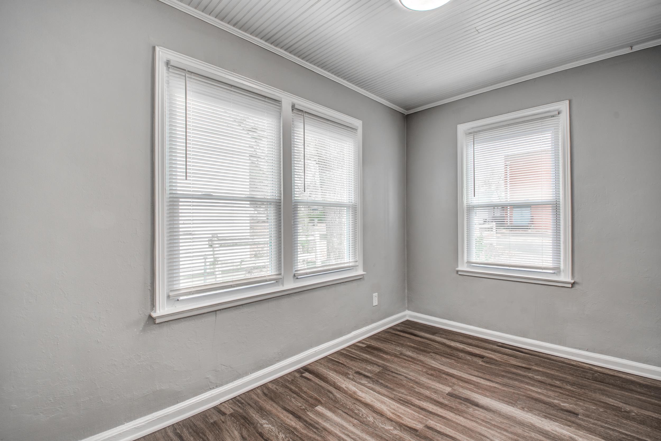 835 Watson Street Memphis, TN 38111 - Photo 22 of 24 Spare room with dark wood-style floors and ornamental molding