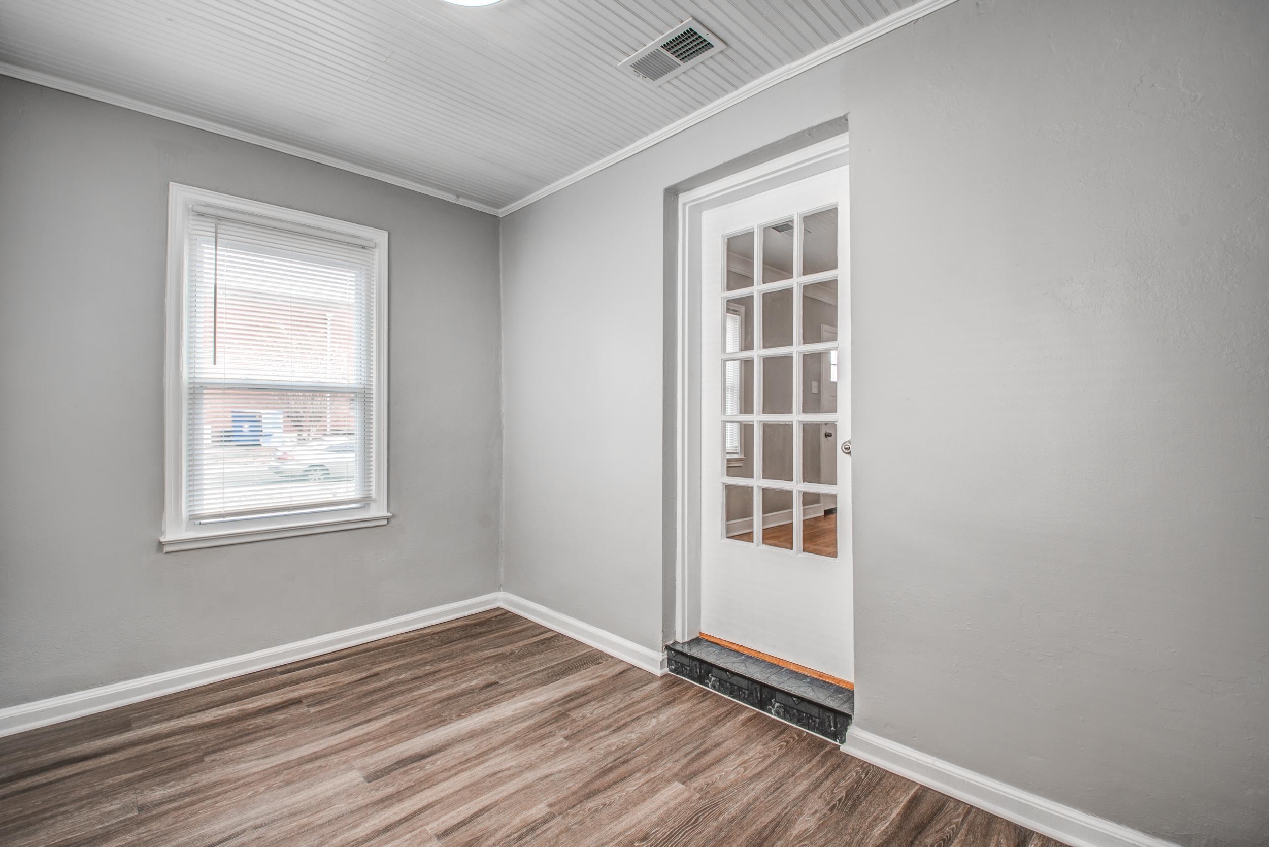 835 Watson Street Memphis, TN 38111 - Photo 24 of 24 Spare room featuring wood finished floors and crown molding