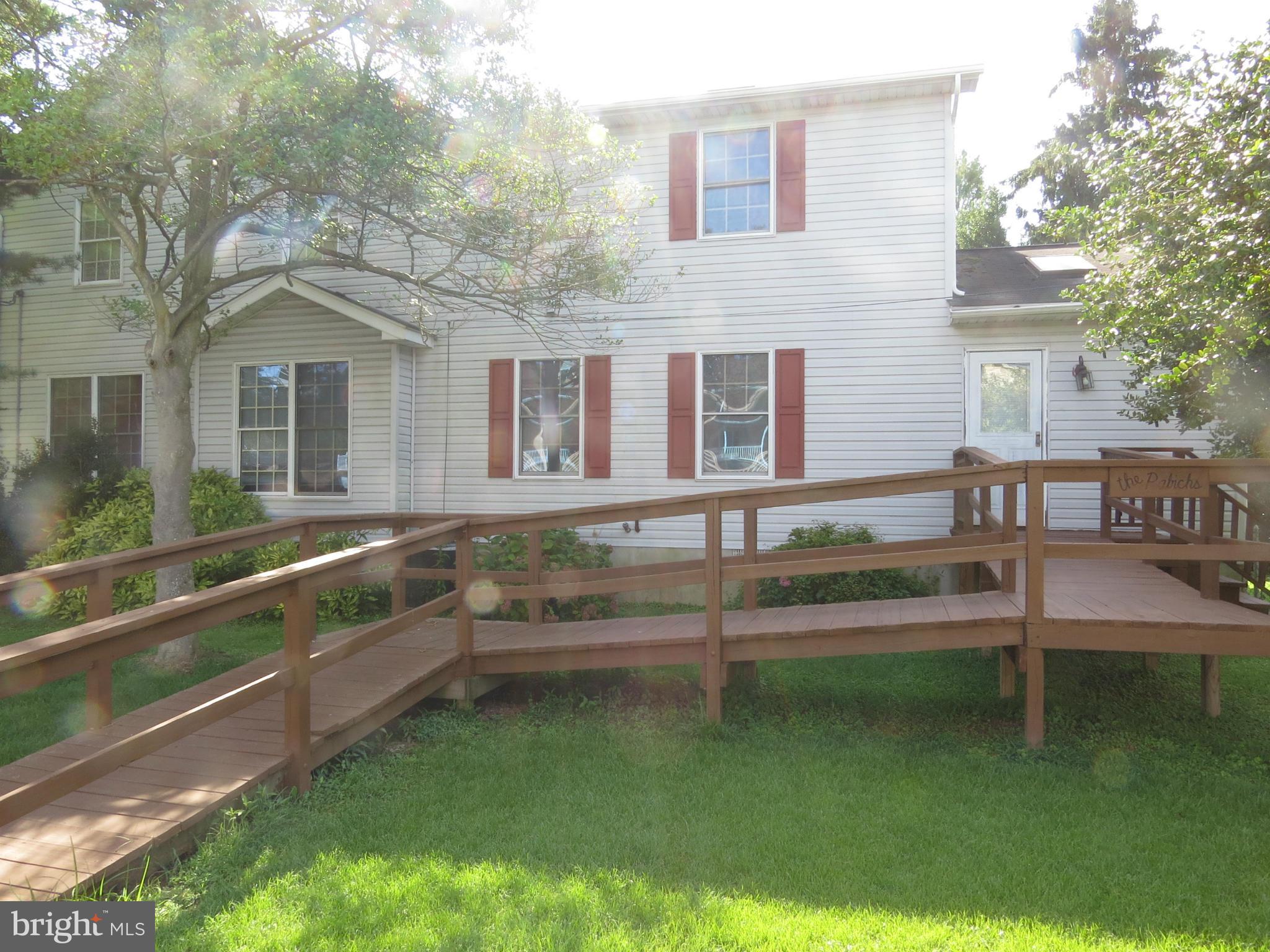 8026 Dogwood Road Baltimore, MD 21219 - Photo 2 of 8 Side VIew from driveway