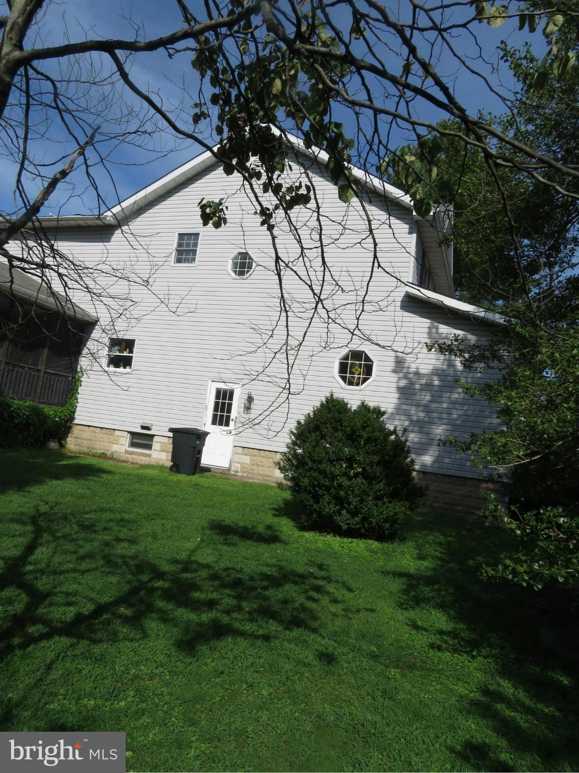 8026 Dogwood Road Baltimore, MD 21219 - Photo 5 of 8 Left side of residence