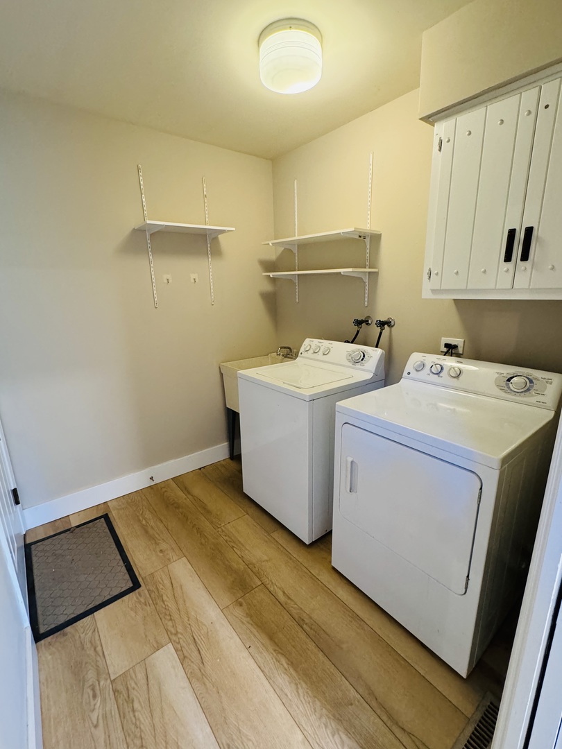 1398 East Gartner Road Naperville, IL 60540 - Photo 12 of 31 a utility room with dryer and washer