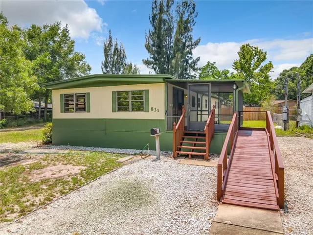 a front view of a house with a porch
