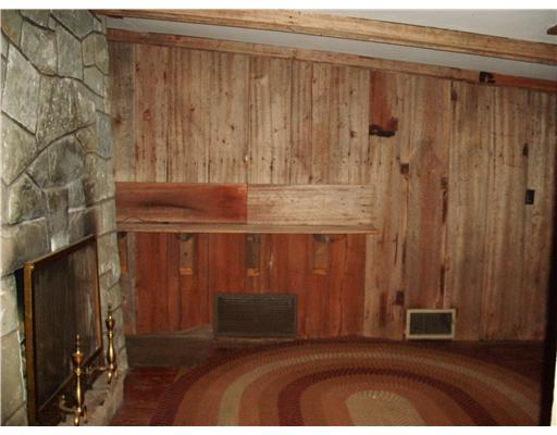 8121 Edwood Road Pittsburgh, PA 15237 - Photo 14 of 18 Den/Family/Great Room. Lower Level Mancave off Game Room with log burning fireplace and rustic wook planks.