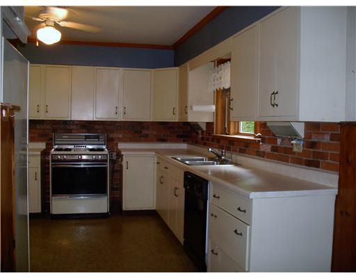 8121 Edwood Road Pittsburgh, PA 15237 - Photo 4 of 18 Kitchen. Exceptional sun-filled kitchen features lots of cabinet space, gas range, refrigerator, dishwasher and ceiling fan