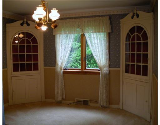 8121 Edwood Road Pittsburgh, PA 15237 - Photo 5 of 18 Dining Room. Engaging formal dining room highlighted by classic built in corner china closets, two large windows with custom sheers, hardwood floor under w/w carpeting and appealing chandelier