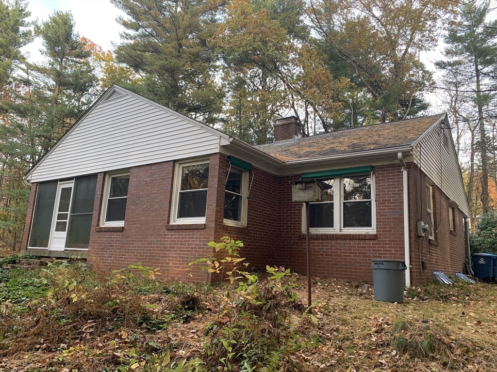 124 Brimfield Road Monson, MA 01057 - Photo 3 of 36 a front view of a house with a yard