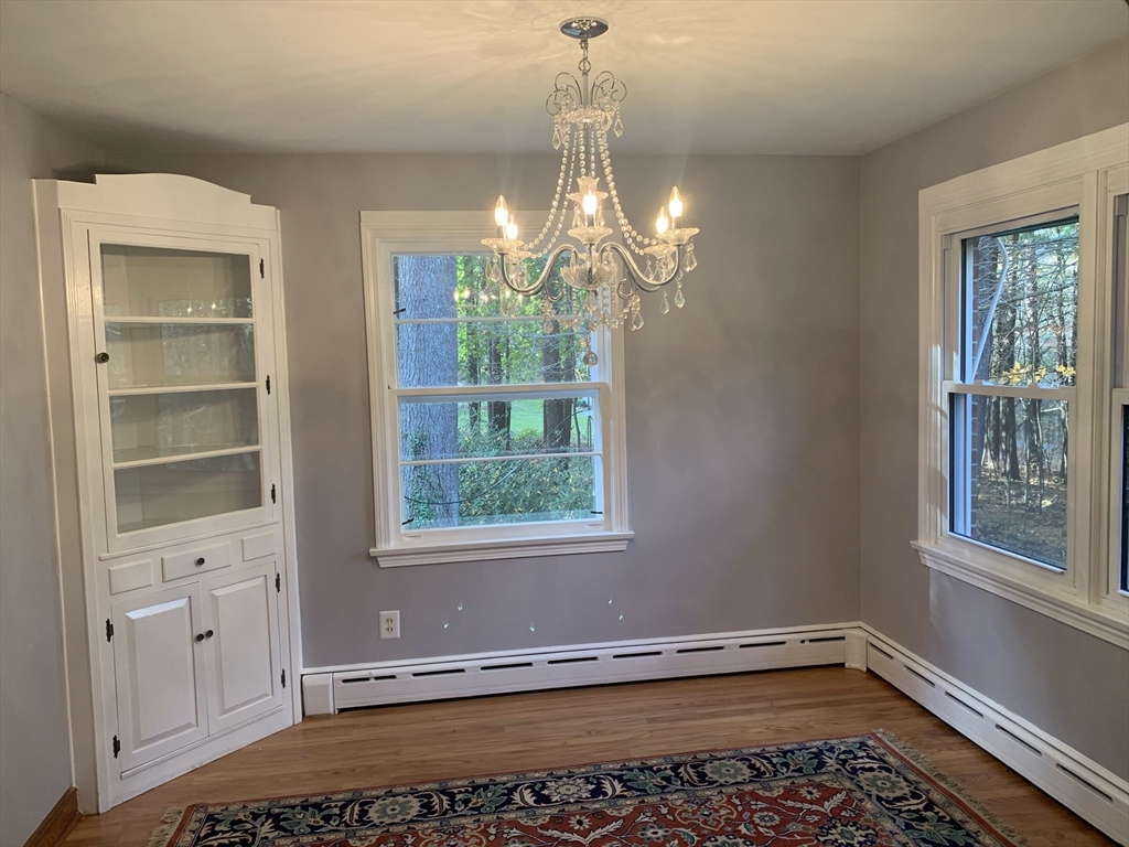 124 Brimfield Road Monson, MA 01057 - Photo 6 of 36 a view of a room with window and wooden floor