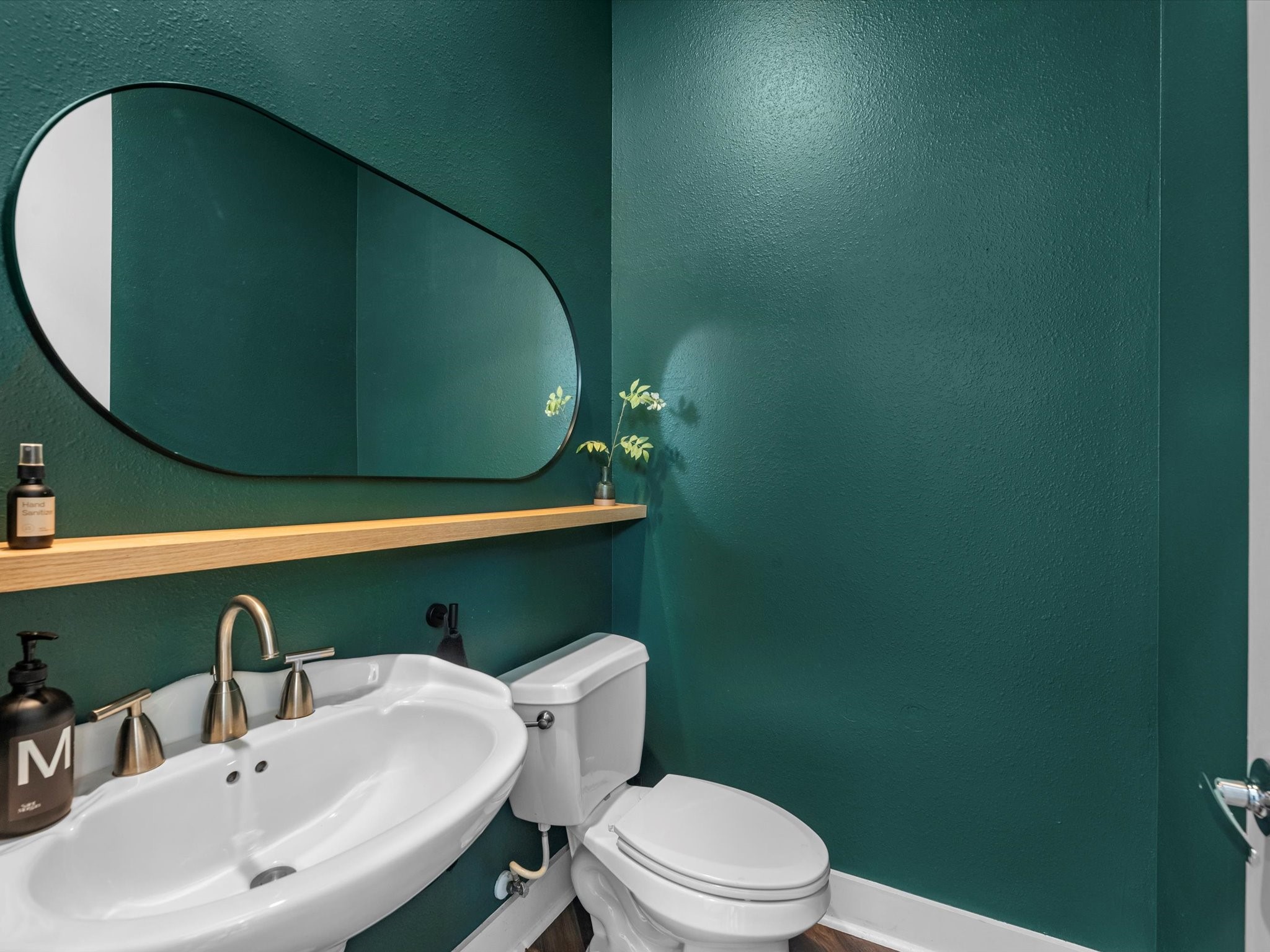 3421 Gillespie Street Houston, TX 77020 - Photo 17 of 34 a bathroom with a sink and a mirror