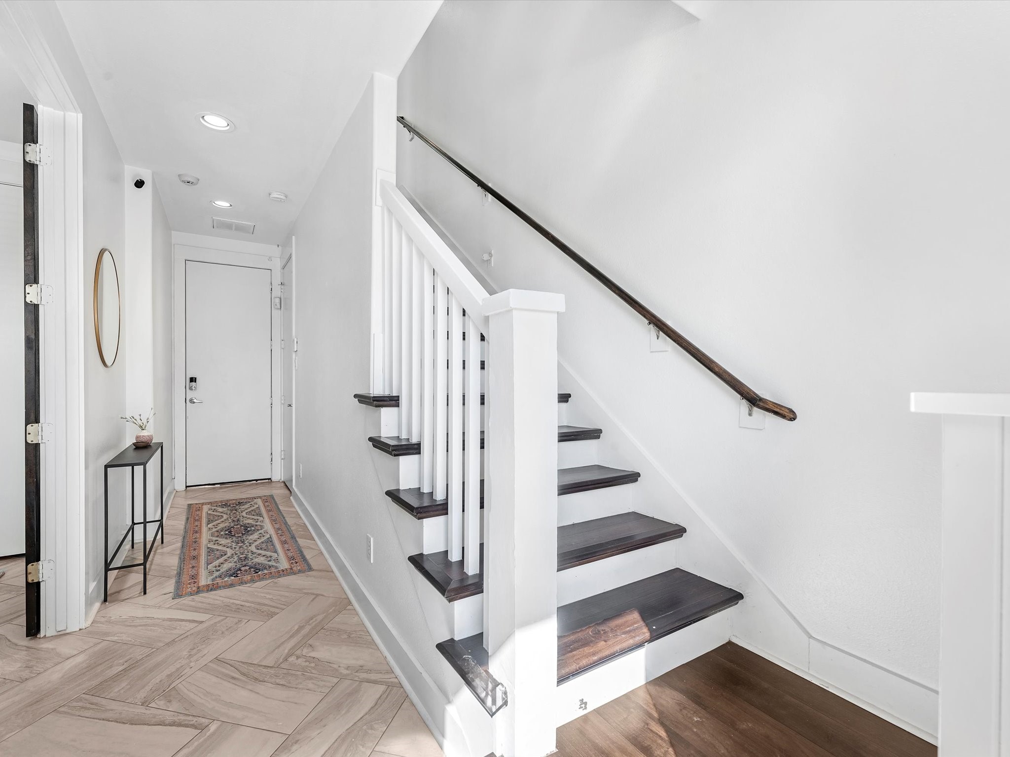 3421 Gillespie Street Houston, TX 77020 - Photo 5 of 34 a view of entryway with wooden floor and stairs