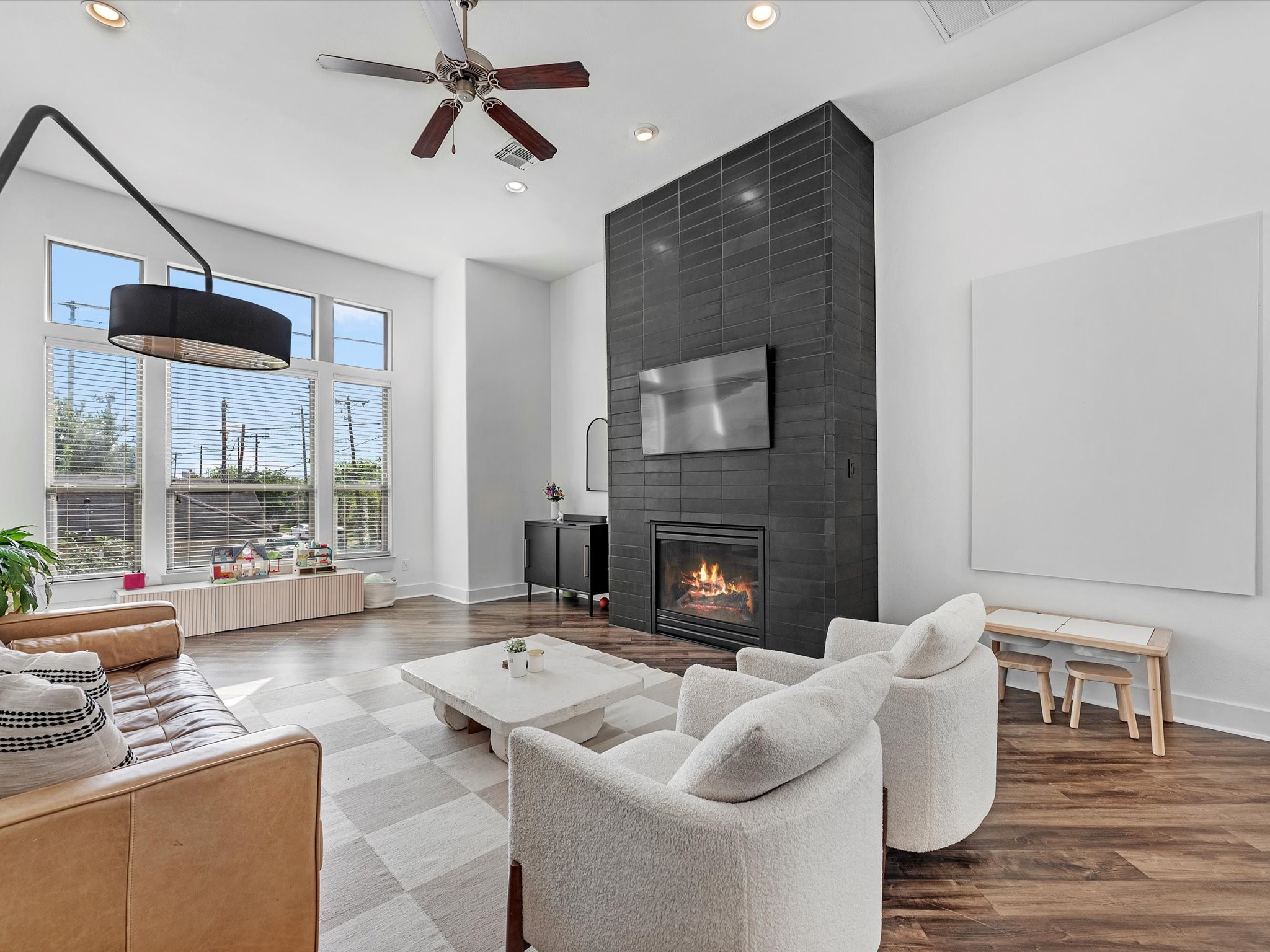 3421 Gillespie Street Houston, TX 77020 - Photo 10 of 34 a living room with furniture and a fireplace