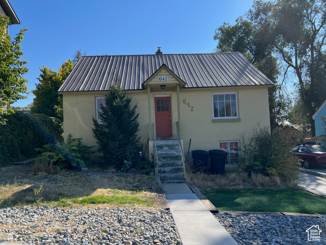 642 East 700 North Logan, UT 84321 - Photo 1 of 33 Bungalow featuring stucco siding and a metal roof