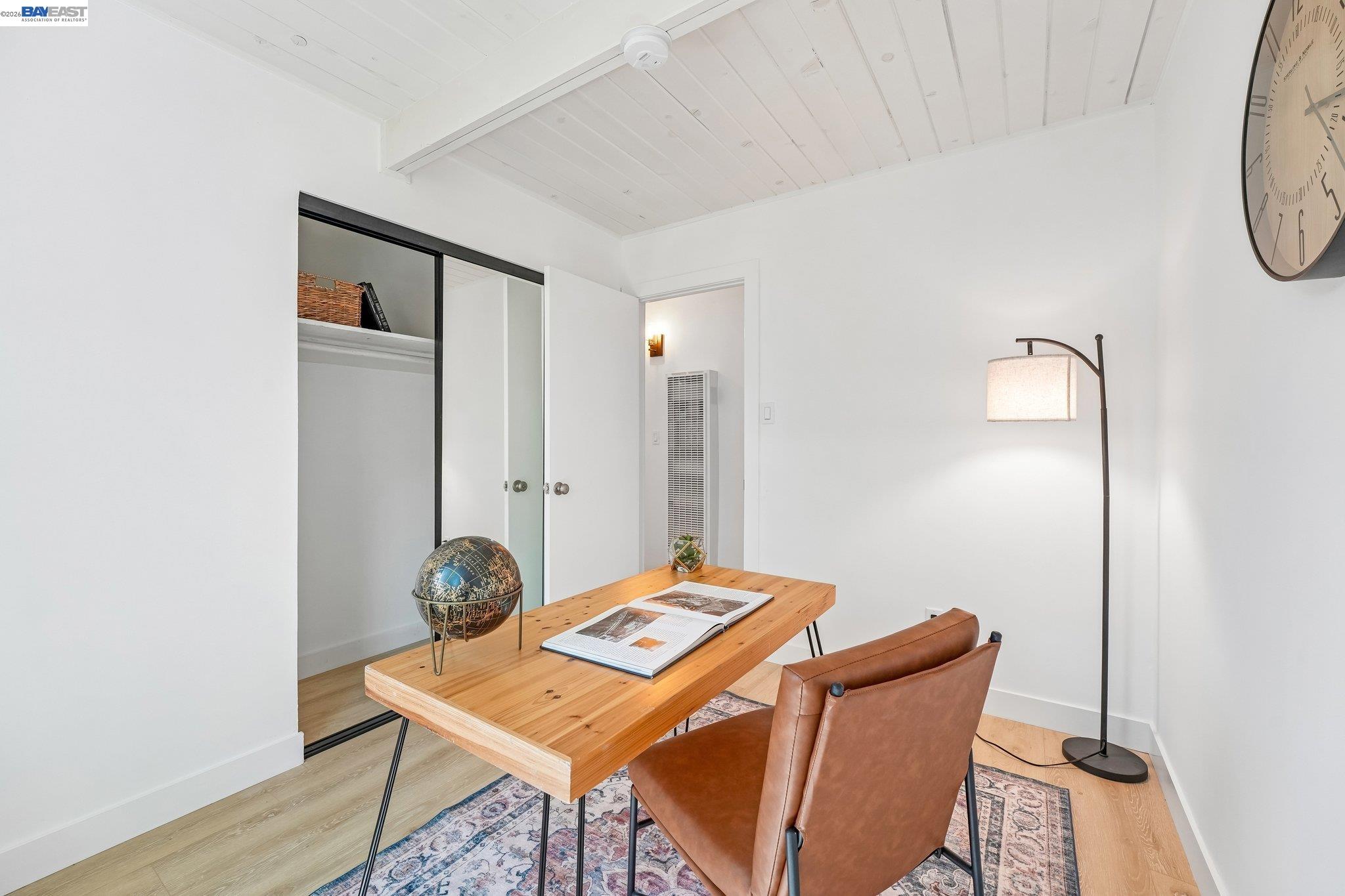 606 West 9th Street Santa Rosa, CA 95401 - Photo 38 of 52 a workspace with furniture and wooden floor