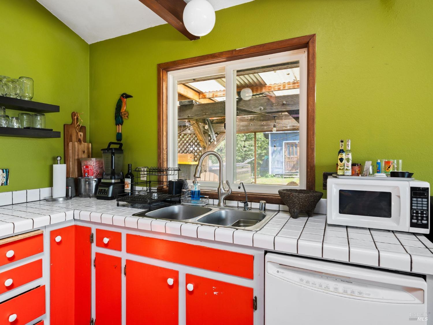 1550 Guntly Road Philo, CA 95466 - Photo 11 of 23 a kitchen with a sink and a large window