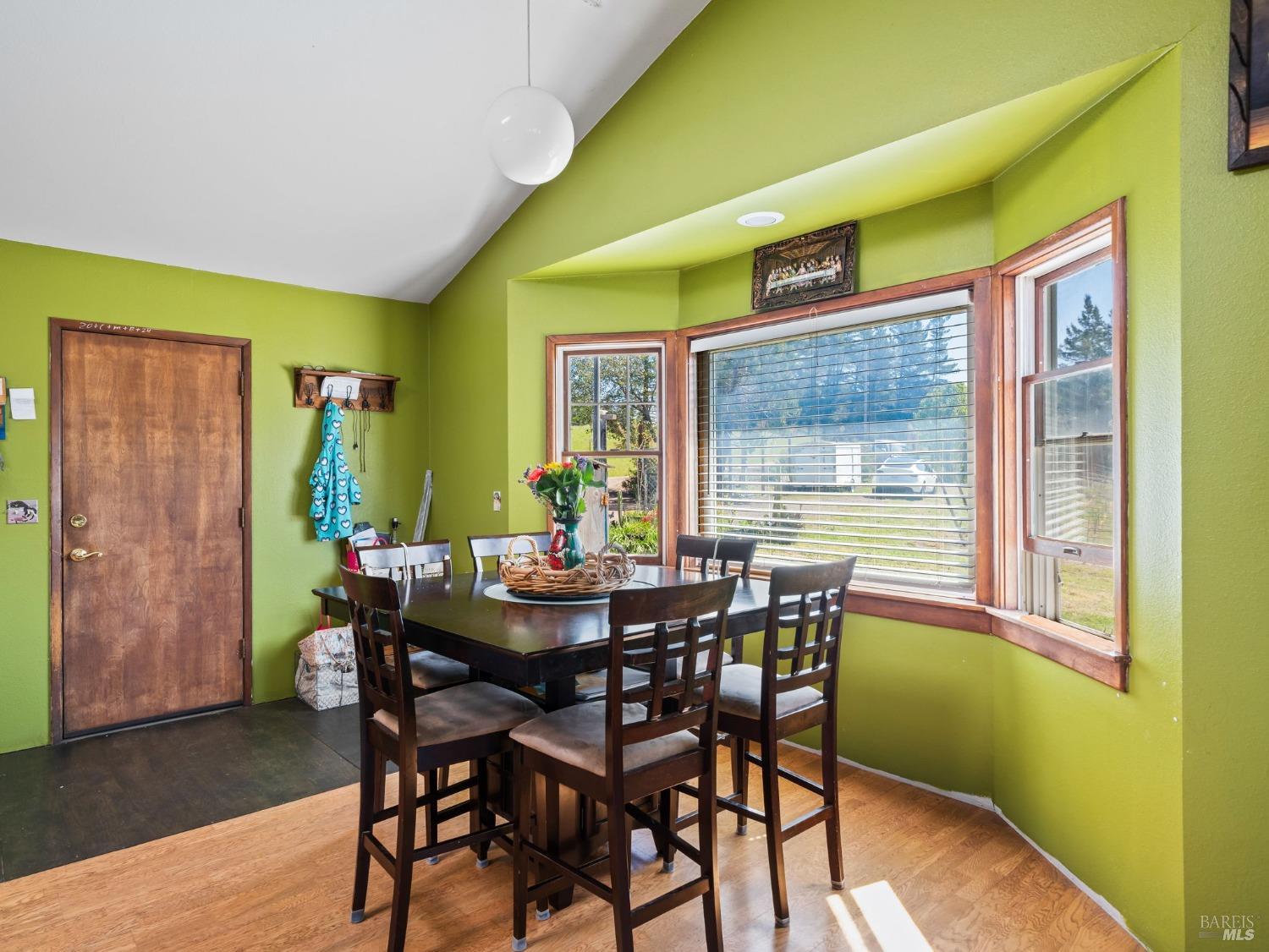 1550 Guntly Road Philo, CA 95466 - Photo 12 of 23 a view of a dining room with furniture and a window