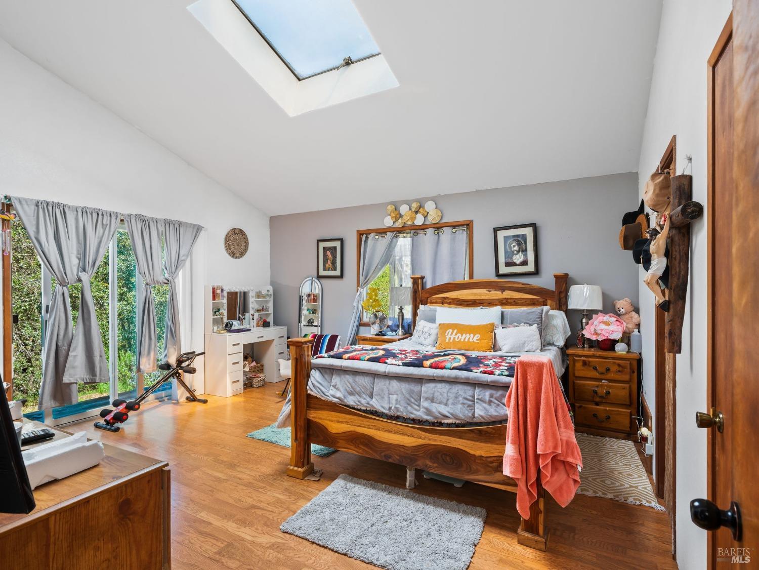 1550 Guntly Road Philo, CA 95466 - Photo 15 of 23 a bedroom with furniture and a large window